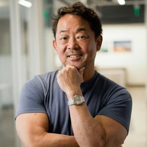 Headshot of Kit Miyamoto.
